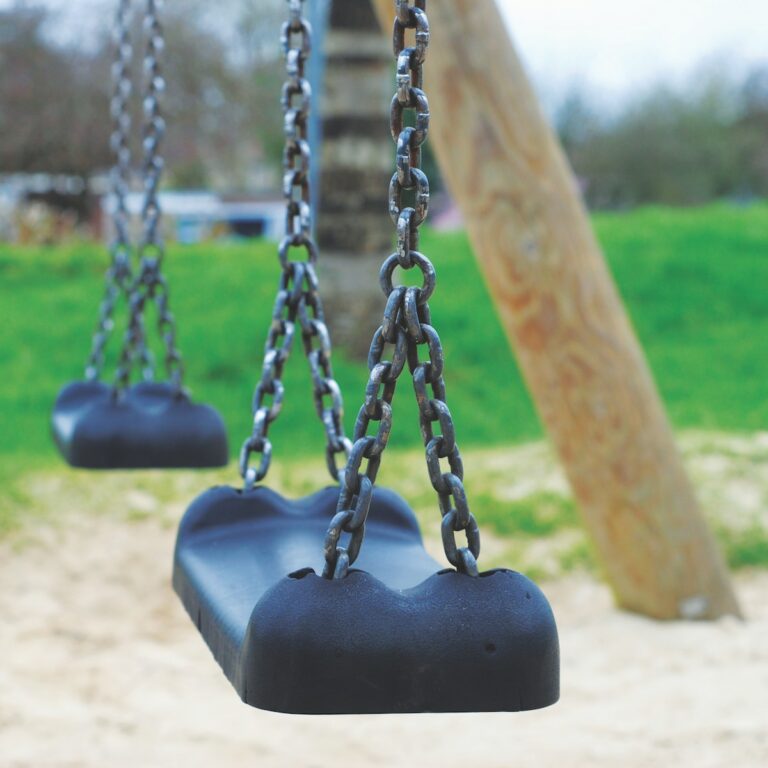 shallow focus photography of swing