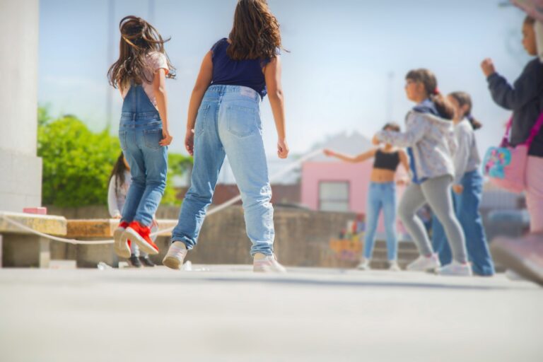 a group of young women standing next to each other