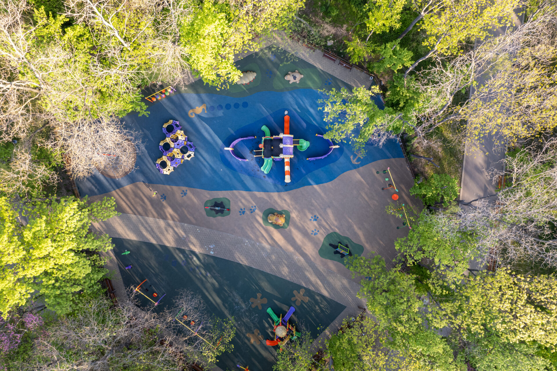 Aerial view of children playground in the park. public playground. top down view.